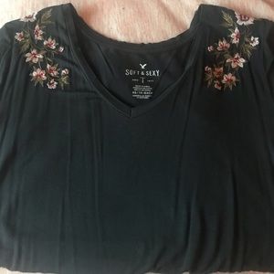 Greenish/ gray shirt with floral embedded on it